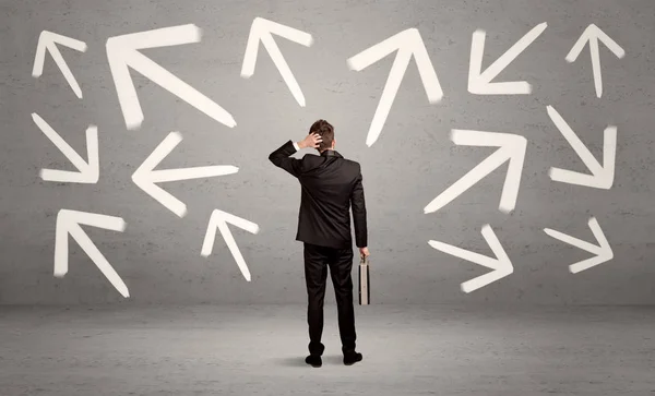 depositphotos_183484968-stock-photo-confused-salesman-with-arrows-on