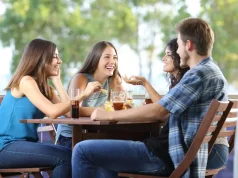 group friends talking drinking home four sitting terrace 66457317
